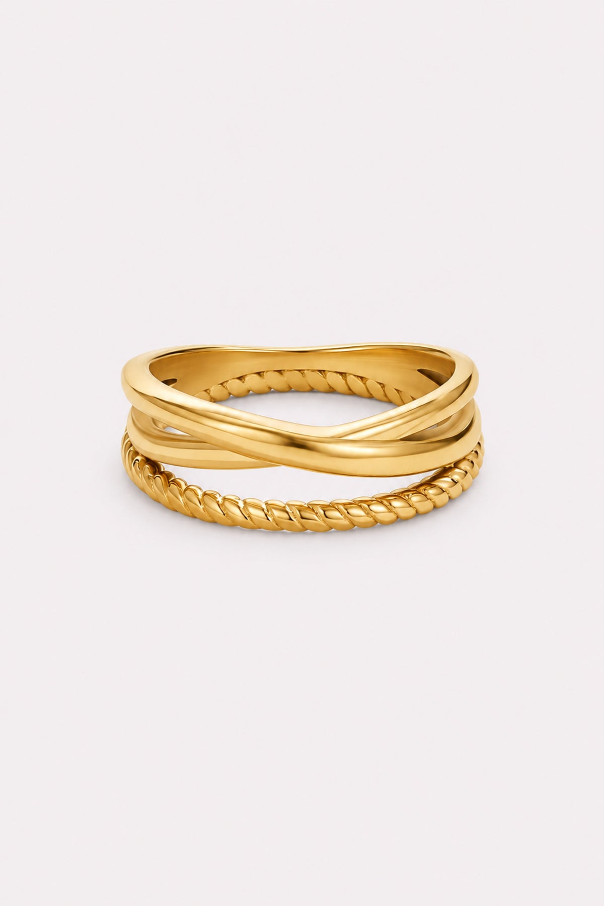 Twist & Gleam Crossed Ring — studio product view